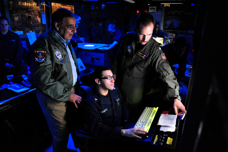 Former SecDef Panetta is shown the command center of the USS Nimitz